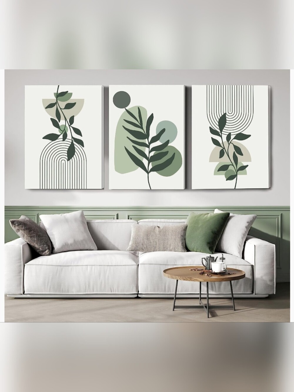Neutral White Sofa with Green Accent Pillows and Botanical Wall Art